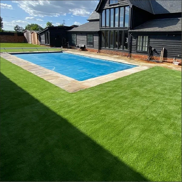 Grass Carpet around swimming pool