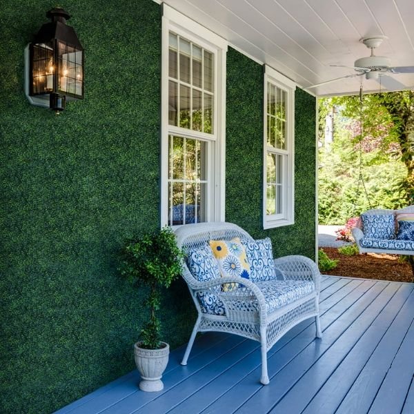 lush green artificial grass install at wall