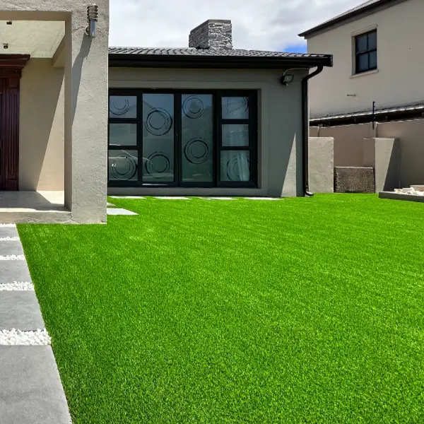 Artificial grass installation on lawn in Dubai